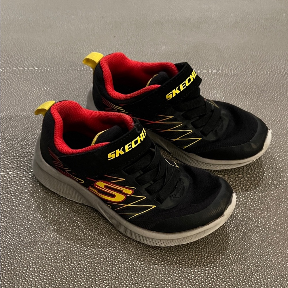 Skechers Kids Black Sneakers with Red and Yellow Accents
